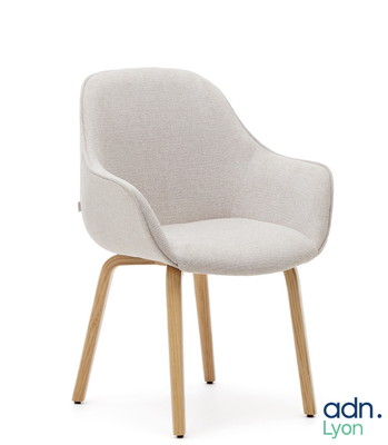 a white chair with a wooden legs and a light gray seat