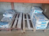 a pallet full of boxes of cement on a pallet