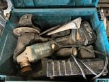 a box full of tools that are sitting on the floor