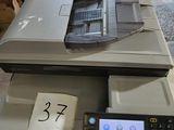 a printer that is sitting on top of a table