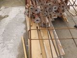 several pieces of wood are stacked on top of each other in a pile