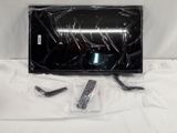 an image of a television screen and remotes wrapped in plastic