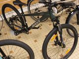 several bikes are lined up in a row on the floor