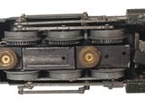 a close up view of a train engine with its doors open