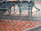 an image of a table and chairs on a patio