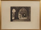 an old photo of an old building with columns and arches