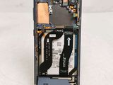 a picture of a cell phone with a broken battery