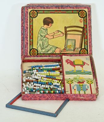 Jeu d'assemblage de perles de chez Fernand Nathand, boite déformée, de - Photo 1