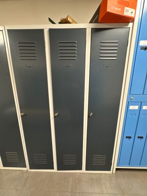 several lockers are lined up in a row in a room