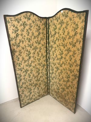 a close up of a folding screen with flowers on it
