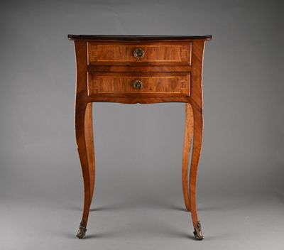 an old wooden table with a drawer on top of it
