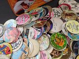 a pile of buttons that are on a table