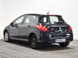 a picture of a small black car parked in a room