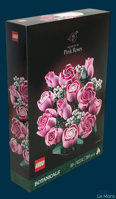 a box with a bunch of pink roses in it