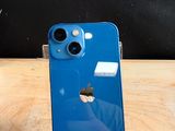a blue iphone sitting on top of a table