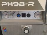 un gros plan d'une machine sur laquelle figurent les lettres « ph9b - r »