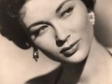 black and white photograph of a woman in a swimsuit posing for a picture