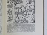 an open book with a picture of animals on it