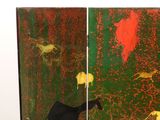 a large screen with a painting of animals on it