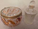 a glass jar with a lid and a glass jar with a lid