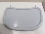 a white toilet seat that is on a table