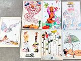 a lot of cards that are sitting on the floor