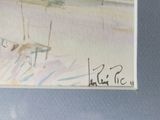 un tableau sur le mur d'une pièce où se trouve un tableau
