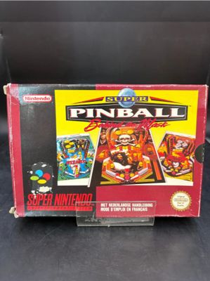 a box of pinball on a black surface