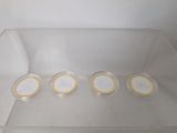 six containers of ice cream sitting in a clear box