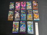 a lot of pokemon trading cards on a table