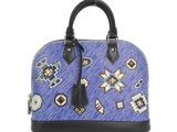 a close up of a handbag on a white background