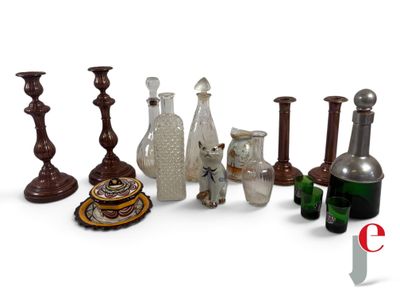 a lot of glass vases that are sitting on a table