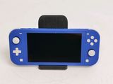 a blue nintendo wii game controller with a black screen