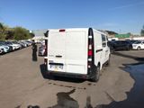 a white van that is parked in a parking lot
