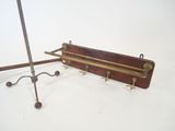 a wooden rack with a coat rack attached to it