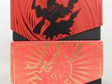 deux boîtes rouges et noires sur lesquelles est représenté un dragon
