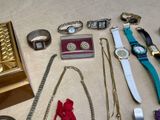 many different types of watches and bracelets laid out on the floor