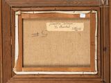 an old picture of a piece of wood with a piece of paper on it