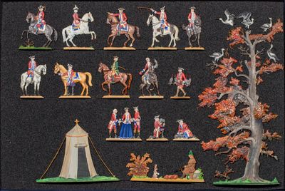 nombreuses figurines de personnes à cheval et de chevaux