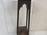 a small wooden table with a shelf on top of it