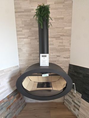 a plant that is sitting on top of a stove