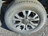 a close up of a tire on a vehicle