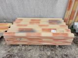 several pieces of wood are stacked on top of each other