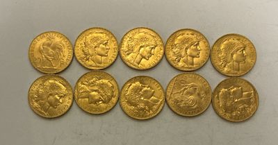 a group of six gold sovereigns