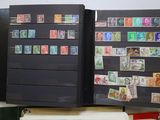 a black book with stamps on it sitting on a table