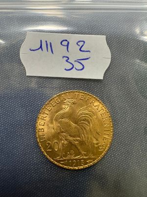 a close up of a coin in a plastic bag on a table