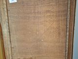 a picture of an old wooden cabinet with a label on it