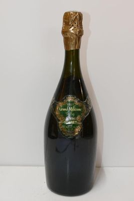 an image of a bottle of champagne sitting on a table