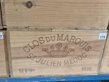 a wooden box with a label on it that says clos du marous