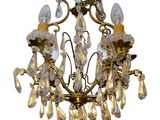 a chandelier made of glass and metal